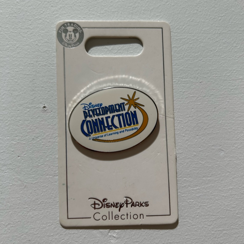 Disney Parks Development Collection Pin with Blue and Gold Design